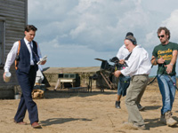 (from left) Johnny Depp and Michael Mann on the set of Public Enemies